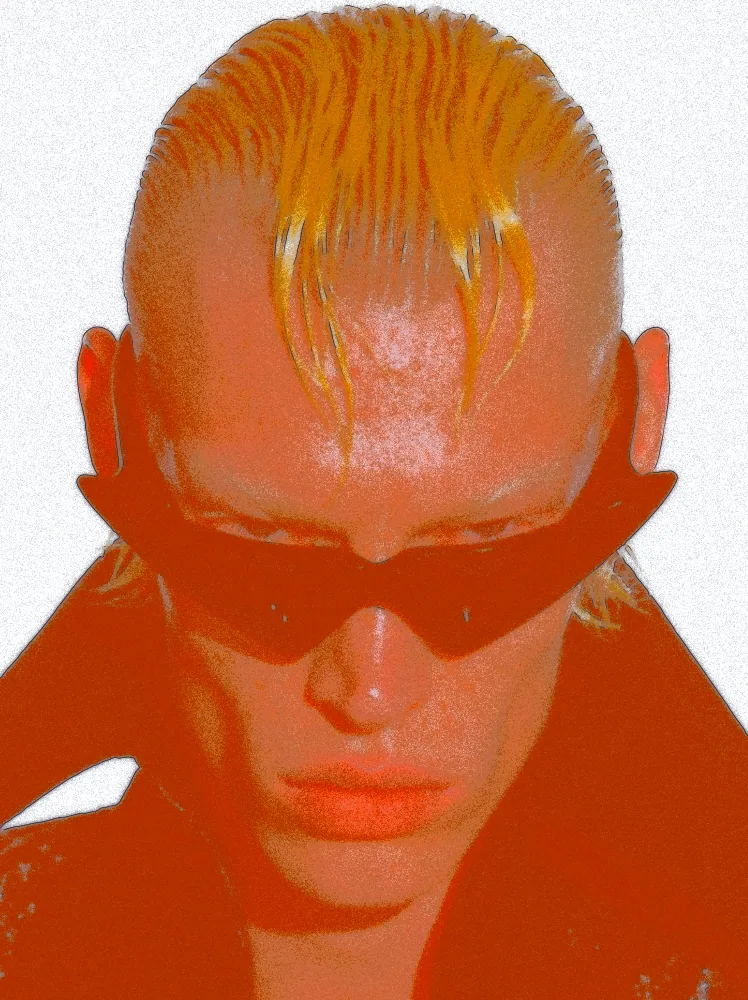 Airbrush Effect on a photo of a man with slicked blond hair and sunglasses