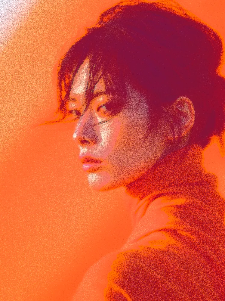 Airbrush Effect on a photo of a woman in an orange turtleneck