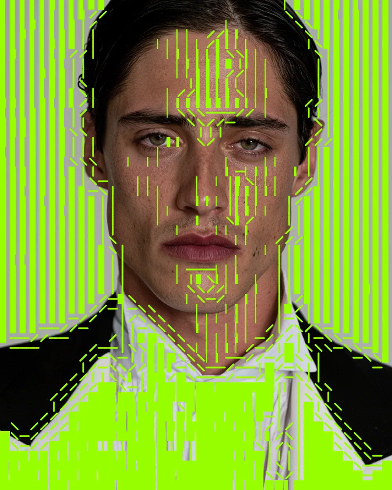 ASCII Art Effect on a photo of a man in a white shirt