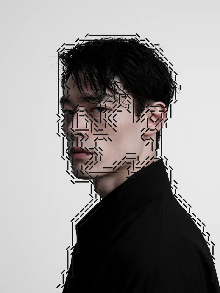 ASCII Art Effect on a photo of a young man in black