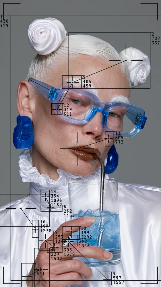 Blob Tracking Effect on a photo of a woman in blue glasses