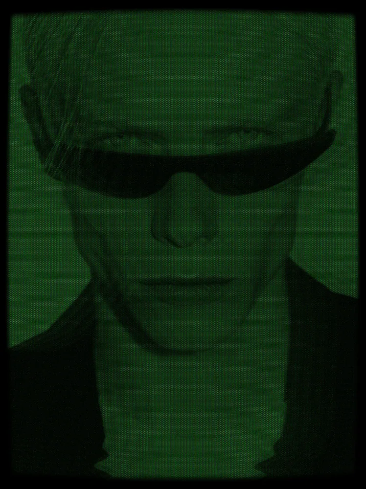 CCTV Effect on a photo of a man with pink hair and black sunglasses