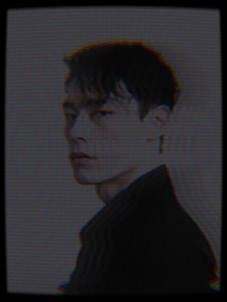 CCTV Effect on a photo of a young man in black