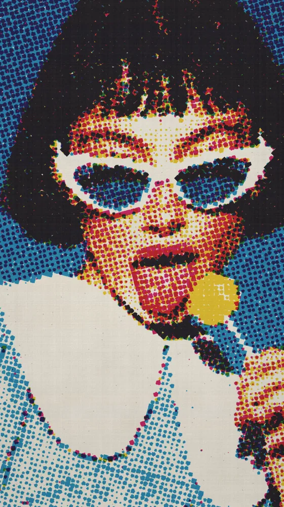 CMYK Effect on a photo of a woman in white cat-eye sunglasses
