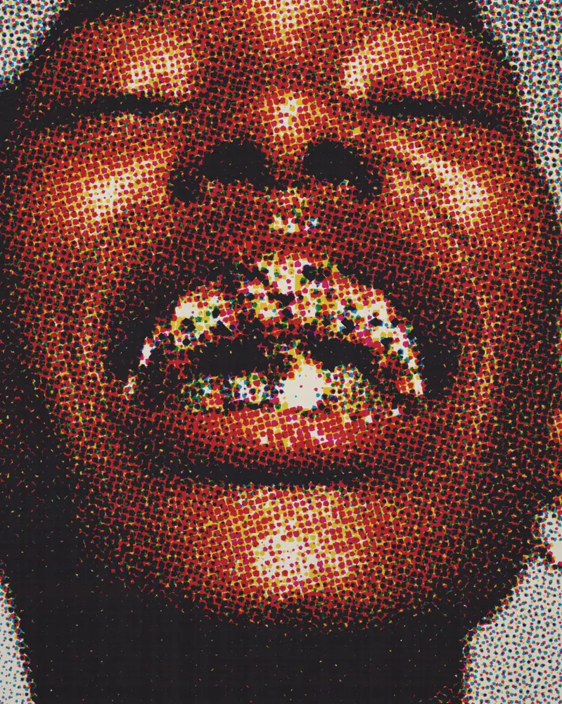 CMYK Effect on a photo of a smile with gold grills