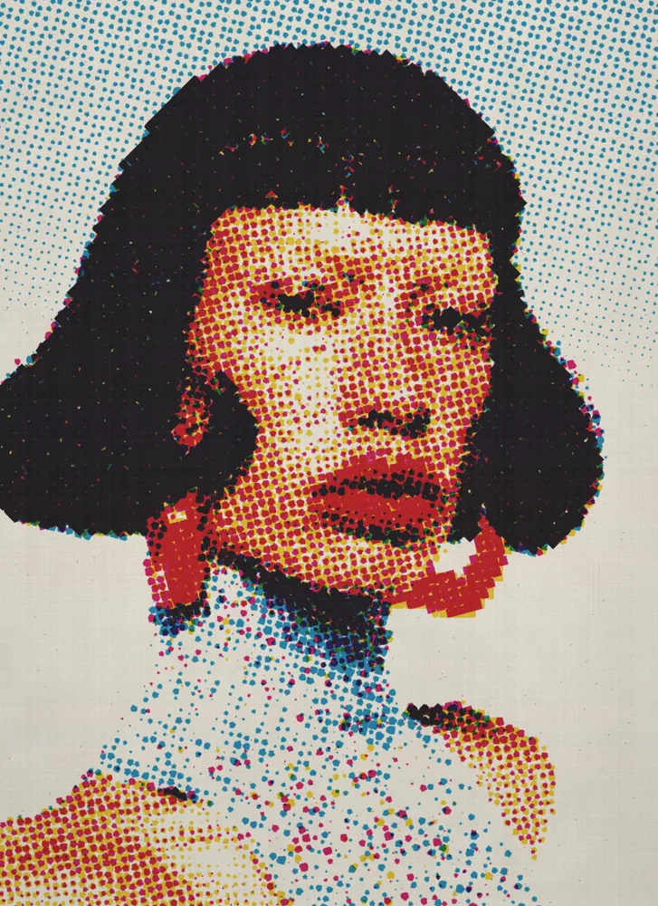 CMYK Effect on a photo of a woman with a black bob and red earrings
