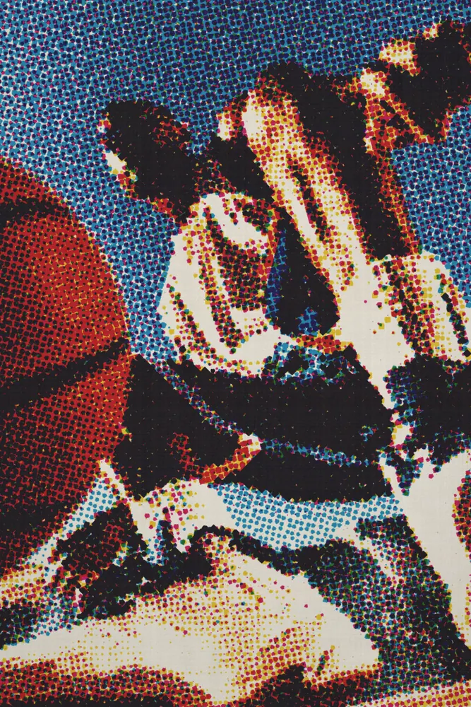 CMYK Effect on a photo of a basketball player mid-jump