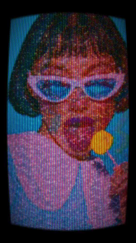 CRT Effect on a photo of a woman in white cat-eye sunglasses