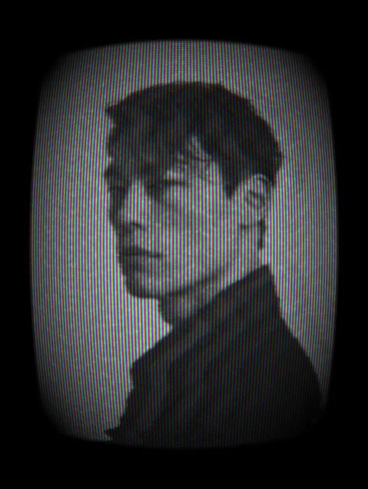 CRT Effect on a photo of a young man in black