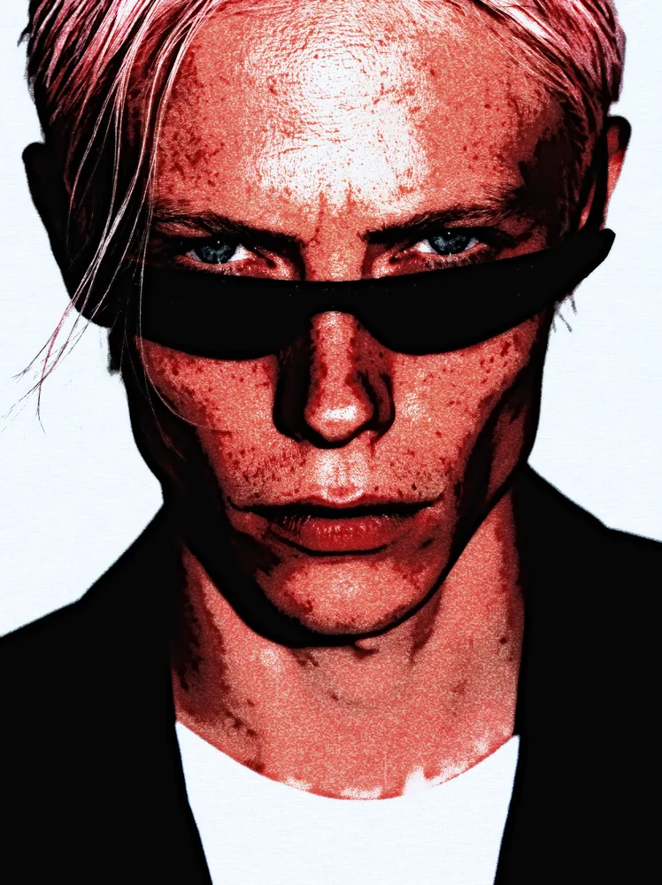 Grunge Effect on a photo of a man with pink hair and black sunglasses