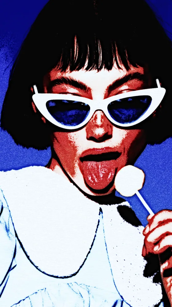 Grunge Effect on a photo of a woman in white cat-eye sunglasses