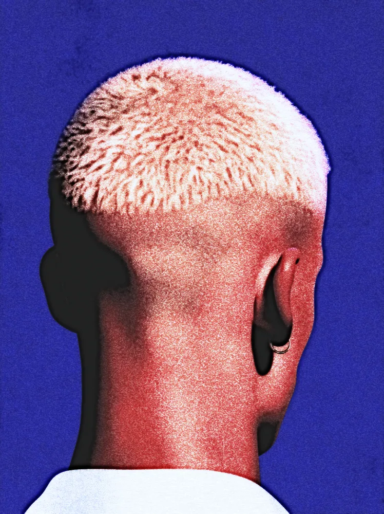 Grunge Effect on a photo of the back of a blond buzz cut