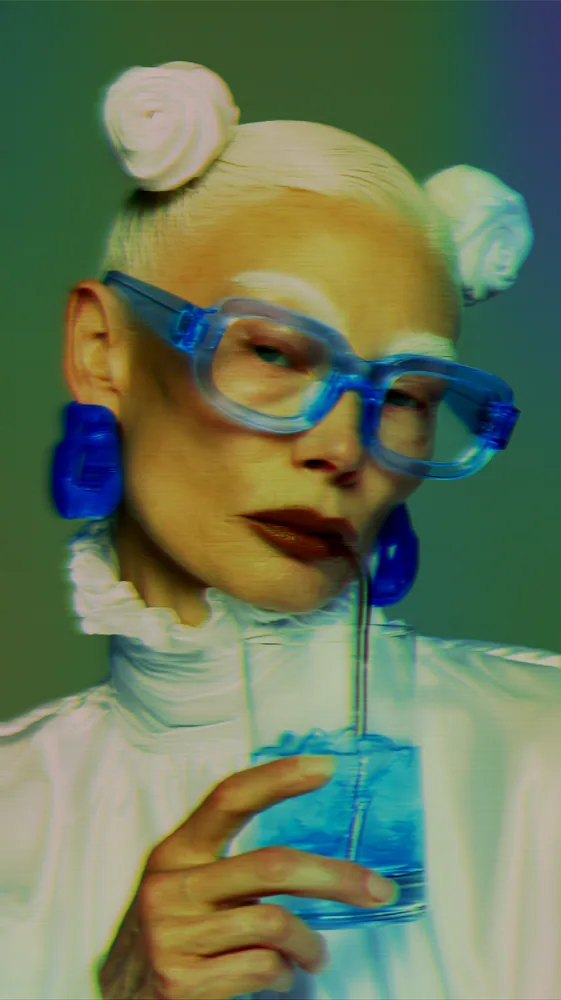 Holographic Effect on a photo of a woman in blue glasses