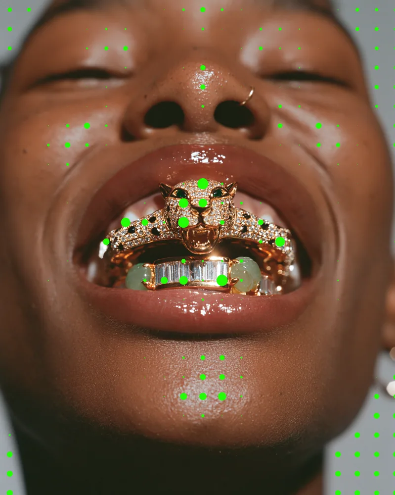 Metaball Effect on a photo of a smile with gold grills