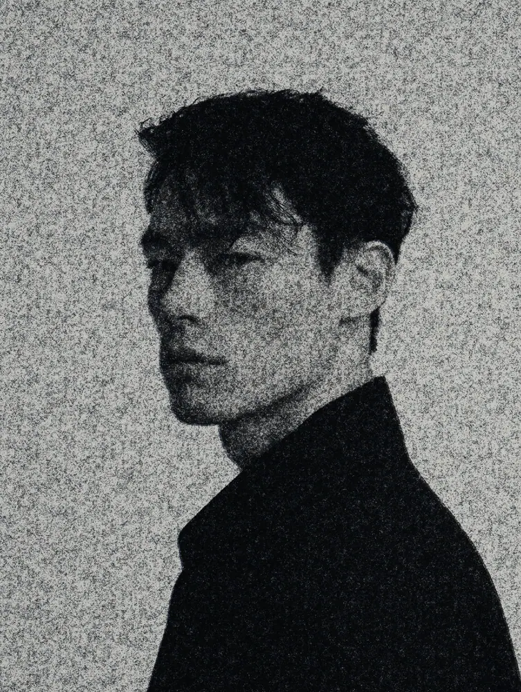 Newspaper Effect on a photo of a young man in black