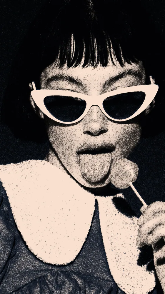 Newspaper Effect on a photo of a woman in white cat-eye sunglasses