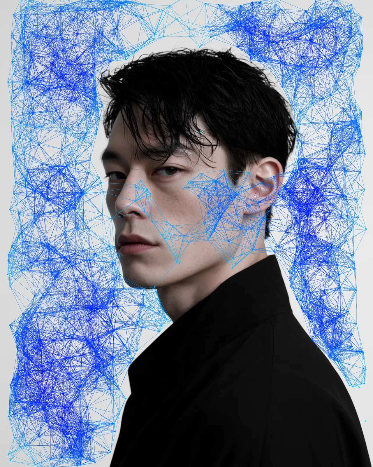The same portrait overlaid with a web of blue dots and thin lines, dense across the background and sparse over the cheek and nose.