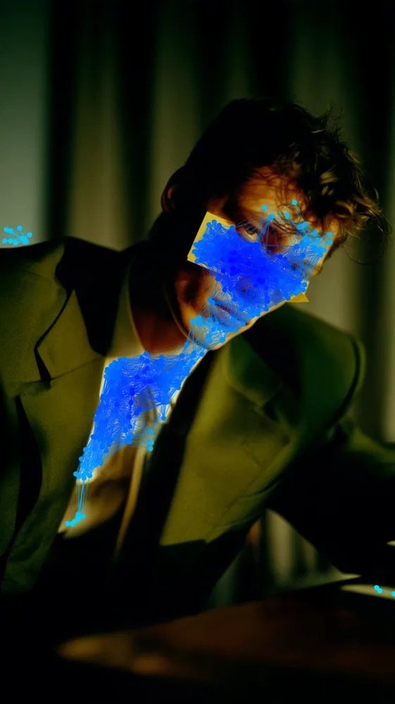 Plexus Effect on a photo of a man in a suit under yellow light