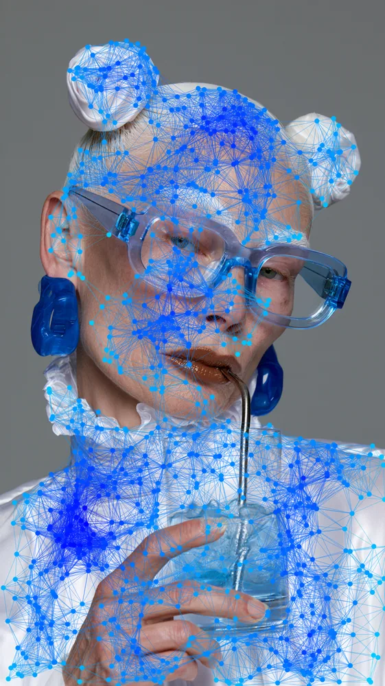 Plexus Effect on a photo of a woman in blue glasses