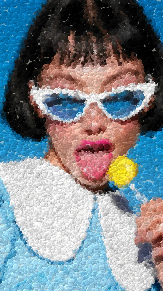 Pointillism Effect on a photo of a woman in white cat-eye sunglasses