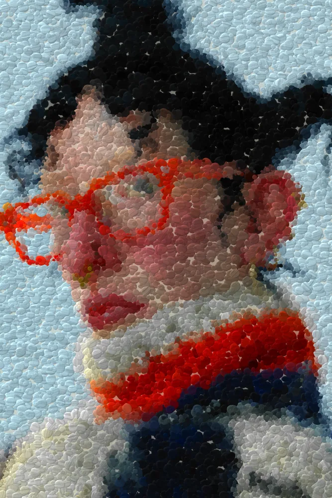 Pointillism Effect on a photo of a woman in orange glasses and a knit collar