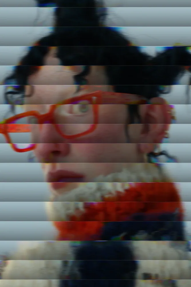 Reeded Glass Effect on a photo of a woman in orange glasses and a knit collar
