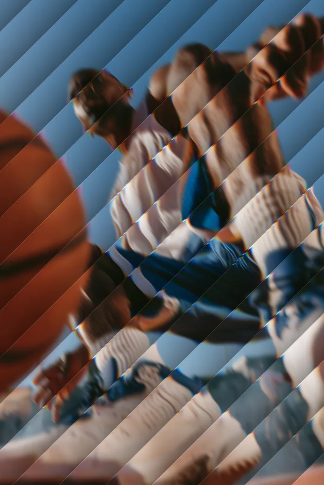 Reeded Glass Effect on a photo of a basketball player mid-jump