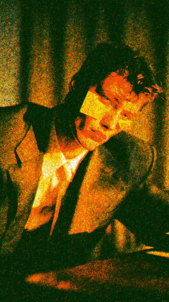 Risograph Effect on a photo of a man in a suit under yellow light