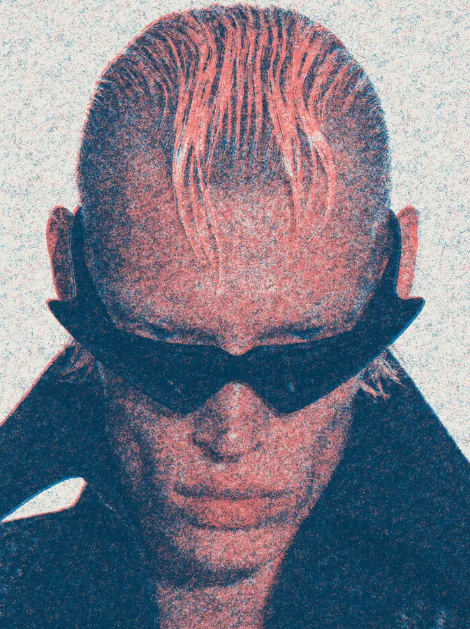 Risograph Effect on a photo of a man with slicked blond hair and sunglasses