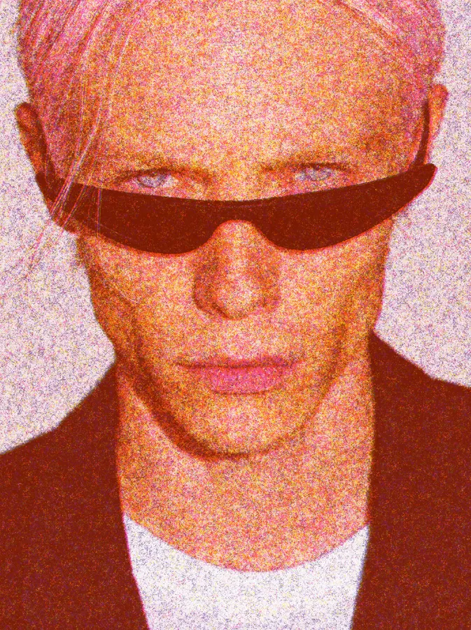 Risograph Effect on a photo of a man with pink hair and black sunglasses