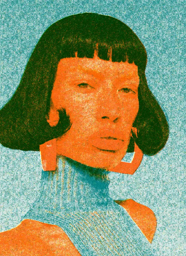 Risograph Effect on a photo of a woman with a black bob and red earrings
